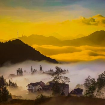 Panoramic view of suset in the misty Sapa mountains